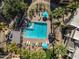 Aerial view of a community pool with lounge chairs and umbrellas at 11333 N 92Nd St # 2072, Scottsdale, AZ 85260