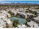Stunning aerial view of community featuring tennis court and mountain views at 11333 N 92Nd St # 2072, Scottsdale, AZ 85260