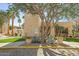 The front of the building is surrounded by mature landscaping at 11333 N 92Nd St # 2072, Scottsdale, AZ 85260