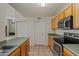 Kitchen featuring oak cabinets, stainless steel appliances and neutral countertops at 11333 N 92Nd St # 2072, Scottsdale, AZ 85260