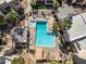 Aerial view of a sparkling pool with lounge chairs surrounded by beautiful landscaping at 11333 N 92Nd St # 2072, Scottsdale, AZ 85260