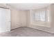 Bright bedroom with a window seat and neutral tones creating a peaceful and inviting space at 1317 E Cobb Dr, Tempe, AZ 85288