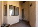Front entrance with neutral paint and trim and desert landscaping at 1317 E Cobb Dr, Tempe, AZ 85288