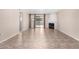 The large living room features tile flooring, a fireplace, and sliding glass doors to the backyard at 1317 E Cobb Dr, Tempe, AZ 85288