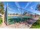 Community tennis court area featuring new nets, desert landscaping, and a secure fence at 1317 E Cobb Dr, Tempe, AZ 85288