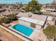 A nice aerial view of pool and fenced yard in back at 1649 E Dana Ave, Mesa, AZ 85204