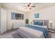 Inviting bedroom features a comfortable bed, ample closet space, and a bright window, ideal for restful nights at 1649 E Dana Ave, Mesa, AZ 85204