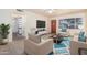Cozy living room features a plush rug, bright natural light, and comfortable furniture, creating a relaxing atmosphere at 1649 E Dana Ave, Mesa, AZ 85204