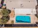 Aerial view of a private backyard pool, showing its blue water and surrounding patio space at 1649 E Dana Ave, Mesa, AZ 85204