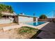 Home backyard featuring a clear blue swimming pool at 1649 E Dana Ave, Mesa, AZ 85204