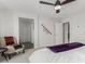 Comfortable bedroom featuring a ceiling fan, accent chair, and neutral decor at 17339 W Paraiso Ln, Surprise, AZ 85387