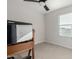 Bedroom featuring a desk with a window view at 17339 W Paraiso Ln, Surprise, AZ 85387