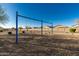 Community playground featuring swings in a well maintained common area with houses in the background at 17339 W Paraiso Ln, Surprise, AZ 85387