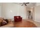 Inviting living space with tile floors, and comfortable seating arrangements at 18123 W Hayden Dr, Surprise, AZ 85374