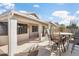 Cozy covered patio area with outdoor seating, perfect for relaxing and enjoying the Arizona weather at 18123 W Hayden Dr, Surprise, AZ 85374