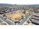 Aerial view of a community featuring an open space with a playground for residents to enjoy at 18508 W Galveston St, Goodyear, AZ 85338