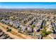 High aerial view of a large neighborhood featuring a mix of single-Gathering homes at 19221 N Toya St, Maricopa, AZ 85138