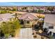 Aerial view of a beautiful home with well-maintained landscaping, spacious driveway, and inviting curb appeal at 19221 N Toya St, Maricopa, AZ 85138