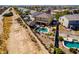 Aerial view showcasing a backyard pool with gazebo, seating area, and desert landscaping at 19221 N Toya St, Maricopa, AZ 85138