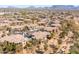 Panoramic aerial view showcasing the Grayhawk community featuring lush landscaping and stunning mountain backdrop at 19700 N 76Th St # 1080, Scottsdale, AZ 85255