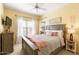 Comfortable bedroom with large windows, neutral tones and ample natural light at 19700 N 76Th St # 1080, Scottsdale, AZ 85255
