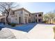 A beautiful two-story stucco condo featuring a tile roof and spacious parking area at 19700 N 76Th St # 1080, Scottsdale, AZ 85255
