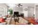 A bright living area with a large TV, comfortable seating, and lots of natural light at 19700 N 76Th St # 1080, Scottsdale, AZ 85255