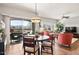 Bright living room with a sliding glass door to an outdoor patio at 19700 N 76Th St # 1080, Scottsdale, AZ 85255