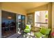 Cozy patio with views through the living space and overlooking the landscape at 19700 N 76Th St # 1080, Scottsdale, AZ 85255