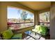 Inviting patio featuring comfortable seating and scenic views of lush greenery at 19700 N 76Th St # 1080, Scottsdale, AZ 85255