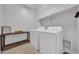 Bright laundry room with a side-by-side washer and dryer at 20159 E Rosa Rd, Queen Creek, AZ 85142