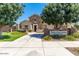 Welcome to the community, highlighted by manicured landscaping and the Mary Lou Fulton Aquatic Center sign at 20325 E Hummingbird Dr, Queen Creek, AZ 85142