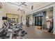 Spacious gym with high ceilings, ceiling fans, and updated equipment at 20715 N 103Rd Pl, Scottsdale, AZ 85255