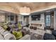 Cozy living room featuring a modern fireplace and stylish decor at 20715 N 103Rd Pl, Scottsdale, AZ 85255