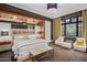 Relaxing bedroom with decorative lighting, seating, and a scenic exterior view at 20715 N 103Rd Pl, Scottsdale, AZ 85255