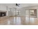 Bright and open living area with a fireplace and sliding door to a patio at 21320 N 56Th St # 1085, Phoenix, AZ 85054