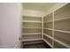 Pantry with multiple shelves for food storage at 21320 N 56Th St # 1085, Phoenix, AZ 85054