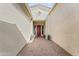 Inviting courtyard featuring a stylish front door and a welcoming entrance at 21432 W Minnezona Ave, Buckeye, AZ 85396