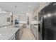 Modern kitchen with stainless steel appliances, a large island, modern cabinets, and recessed lighting at 21432 W Minnezona Ave, Buckeye, AZ 85396