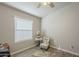 Inviting bedroom with a soft color palette, offering a peaceful retreat with natural light and cozy details at 2206 S Ellsworth Rd # 50B, Mesa, AZ 85209