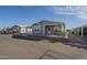 Well-maintained home with a charming front porch and manicured landscaping, set in a friendly neighborhood at 2206 S Ellsworth Rd # 50B, Mesa, AZ 85209