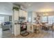 Open kitchen layout with modern appliances flows seamlessly into the dining area and living space at 2206 S Ellsworth Rd # 50B, Mesa, AZ 85209