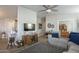 Cozy view of living room space with TV console and open layout, enhancing the home's flow at 2206 S Ellsworth Rd # 50B, Mesa, AZ 85209