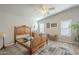 Spacious main bedroom with a bedframe, wood-look floors, and vaulted ceiling at 2206 S Ellsworth Rd # 50B, Mesa, AZ 85209