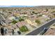 Aerial view of a residential neighborhood featuring desert landscaping and many homes at 22722 N 120Th Ln, Sun City, AZ 85373