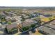 An elevated view showing the community's layout with neat rows of houses and landscaping and desert terrain at 22722 N 120Th Ln, Sun City, AZ 85373