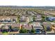 Extensive aerial shot of the residential area showcasing orderly streets and attractive homes with desert landscape in the background at 22722 N 120Th Ln, Sun City, AZ 85373