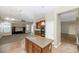 Open-concept kitchen with stainless steel appliances, center island, and generous counter space at 22722 N 120Th Ln, Sun City, AZ 85373