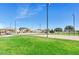 A well-maintained park features an open-air picnic area, volleyball court, and grassy lawn at 22722 N 120Th Ln, Sun City, AZ 85373