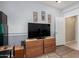Living room features a mounted TV, neutral color scheme and is well-illuminated at 26485 W Yukon Dr, Buckeye, AZ 85396